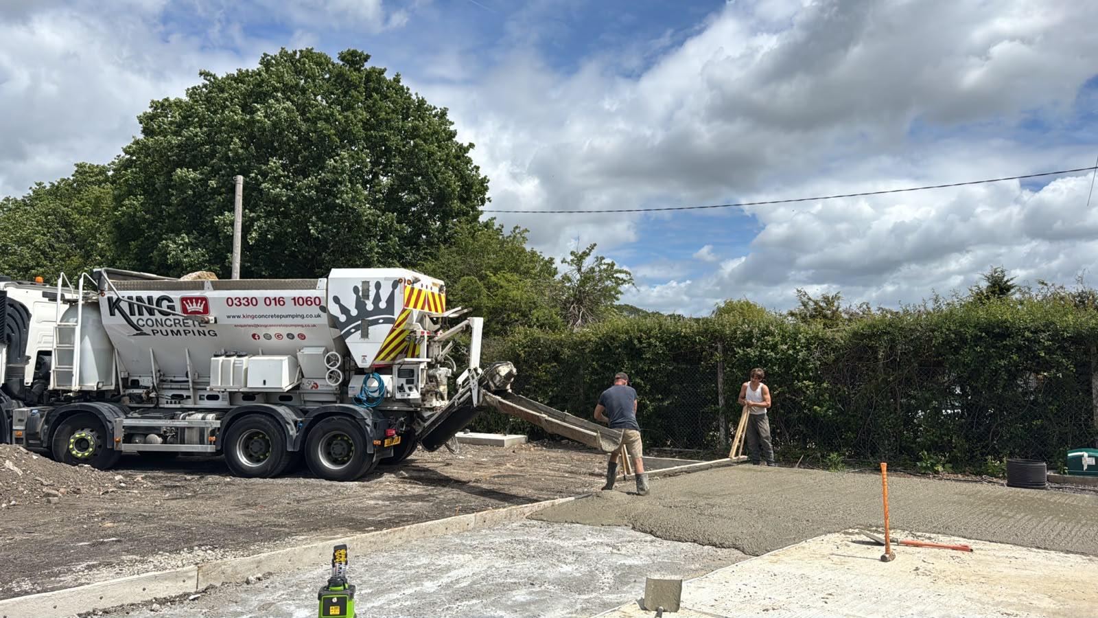 King Concrete Pumping crew placing concrete on a Worthing site